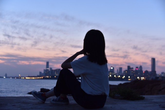 Girl looking out to see Girl looking out to see